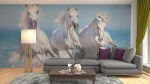 Fotobehang met galopperende paarden in de zee